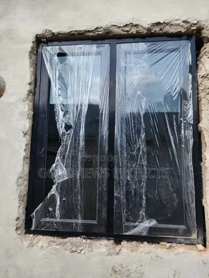 Black Casement Window With {Iron Burglary} and Nets