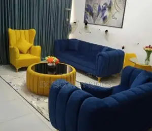 6 Seater Fabric Sofa + Single an Glass Center Ottoman’