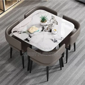 Quality and Imported Marble Top Dining Table by 4 Chairs