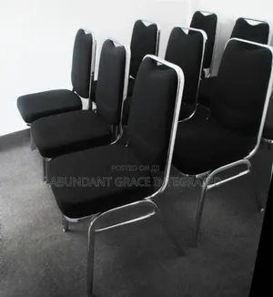 Black Banquet Chair With Stainless Legs.