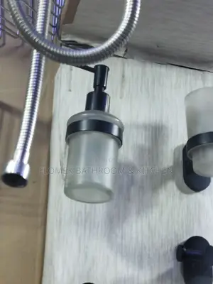 Black Handle Wall Mounted Liquid Soap/Sanitizer Dispenser.
