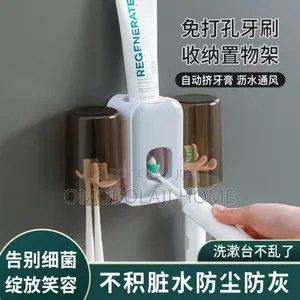 Tooth Paste Dispenser and Brush Holder