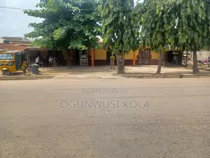 Land With a Hall Shops on Igando Rd