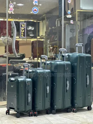 Set of 4 Dark Green Expandable  Polycarbon Luggage Boxs