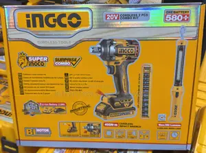A Cordless Impact Wrench and a Cordless Work Lamp