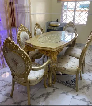 Set of Royal Dining Table and 6 Fabric Chairs.