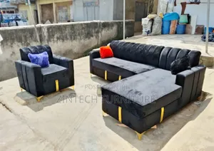 Black Fabric L-Shape Sofas and a Single Seater