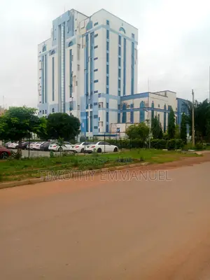 C of O Comprised of 10 Storey Office Tower/4 Storey Shopping