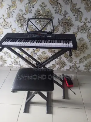 Quality Learner's Keyboard Piano With Stand and Stool