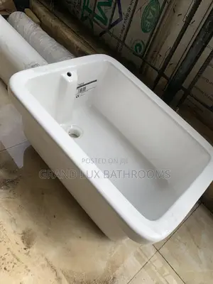 White Rectangular Laundry Sink.