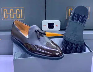Oggi Brown and Black Flat Sole Leather Shoe