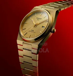 Tissot Yellow Gold Watch