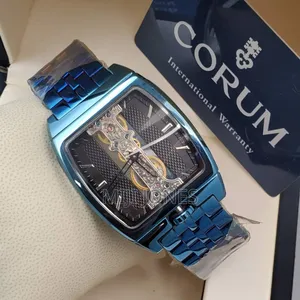 "Timepiece Elegance: Corum Inspired Blue Chain Watch"
