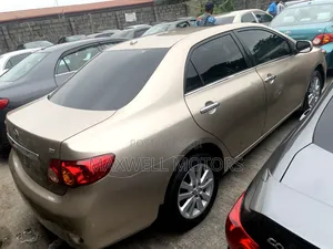 Toyota Corolla LE 4dr Sedan (1.8L 4 cyl 4A) 2009 Gold