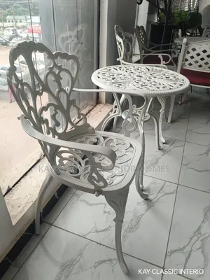 Outdoor Discussion Chairs And Table