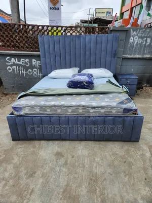 Standard Six by Six Grey Bed.