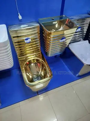 Gold Water Closet With Wall Hung Basin.