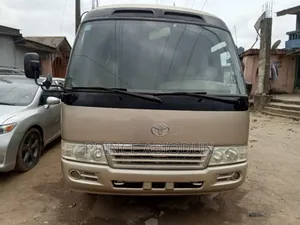 Toyota Coaster 2012 Gold