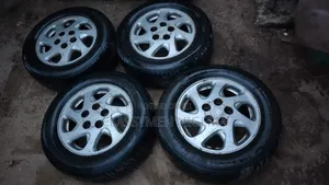Clean Alloy Rims + Barely Used Tires 195/65/15 (Camry, Corolla, Civic)