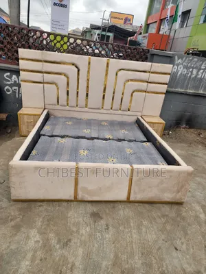 Cream Coloured 6by6 Upholstery Bed Stand With Cupboards