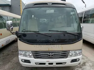 Toyota Coaster 2015 Gold