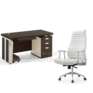 A Set of Office Table With White Executive Leather Chair