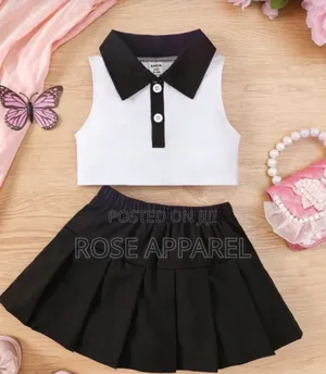 A Skirt and Armless Collared Top