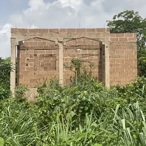 Half Plot of Land With a Two Bedroom Building on It for Sale