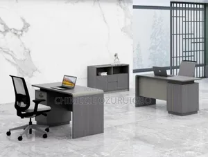 Grey Coloured 1.4 Meters Table With Attached Drawer