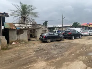 Hanlf Plot of Land Fenced Gated With Development