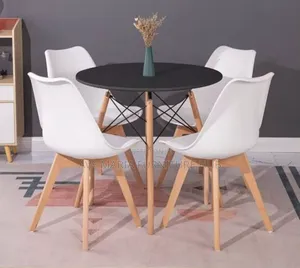 Round Dining Table by 4 Seaters.