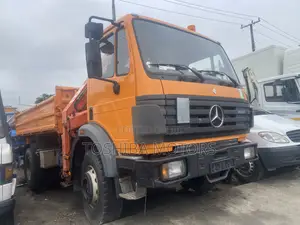 Dump Truck With Man Lift Truck