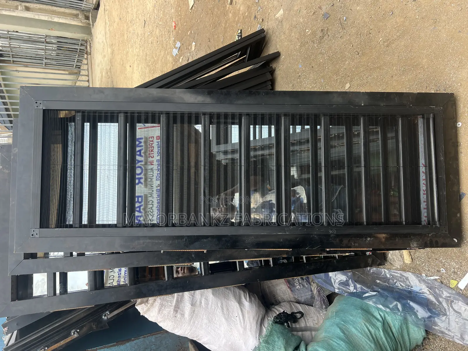 Frameless Window With Collapsible Nets