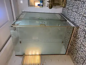 Shower Cubicle With Gold Accesories