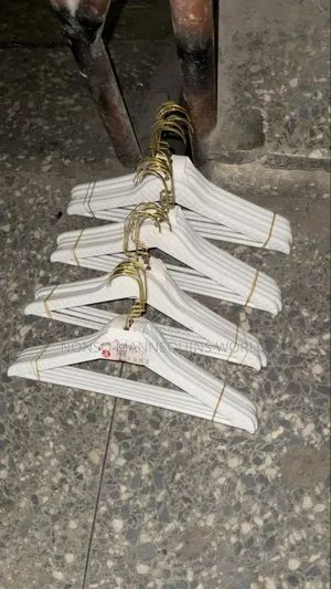 White Hangers With Golden Heads
