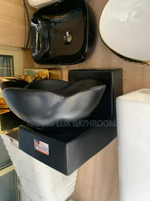 Matte Black Petal-Shape Ceramic Vessel Sink With Square Base