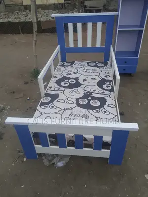 6ft X 3ft Baby Bedframe and Wardrobe Up for Sale. White and Blue