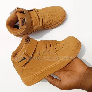 Unisex High-Top Sneakers With Strap.