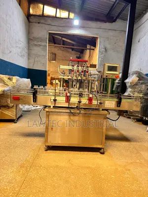 Four Nozzle Liquid Filling Machine