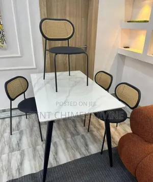 A Classy 4 Seater Dinning Table and Chairs