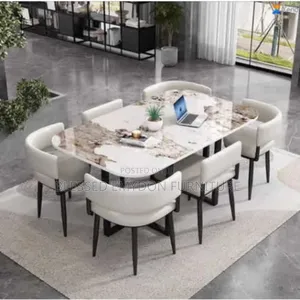 Marble-Finish Rectangular Dining Table Set With Padded Chairs.