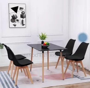 Four Sets of Chairs and Dining Table