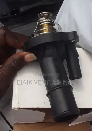 A Brand New Thermostat Ford Escaped. 4 Plug. 2.0. 2012/2013/2014/2015