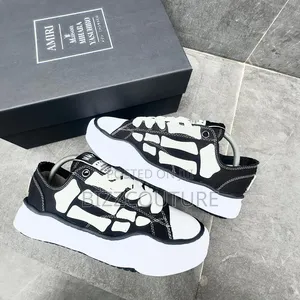 Original Amiri Skel-Top Low Sneakers Available in Store