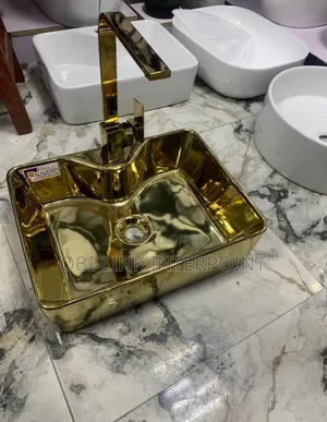 Gold Countertop Basin With Gold Mixer