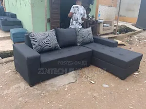 L Shaped Black Color Sofa With Three Pillows