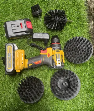 Dewalt Cordless Drill Along With A Set Of Drill Brush