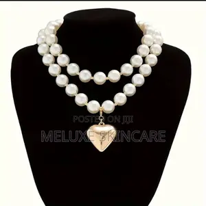 A Luxurious, Elegant and Sweet Imitation Pearl Beaded Love Pendant