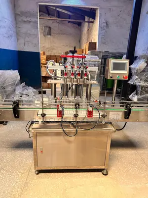 Four Nozzle Liquid Filling Machine