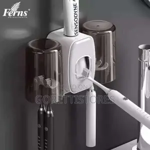 Toothpaste Dispenser and Toothbrush Holder